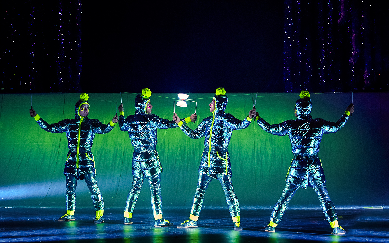 Performers in metallic costumes during Cirque du Soleil 'Twas The Night Before show.